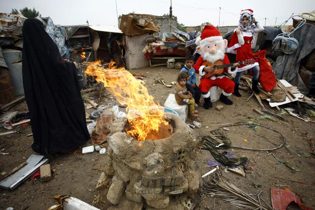 Christmas in a shanty home in the Iraqi city of Najaf. Globally, one in 10 people survive on less than $2 a day, according to Oxfam