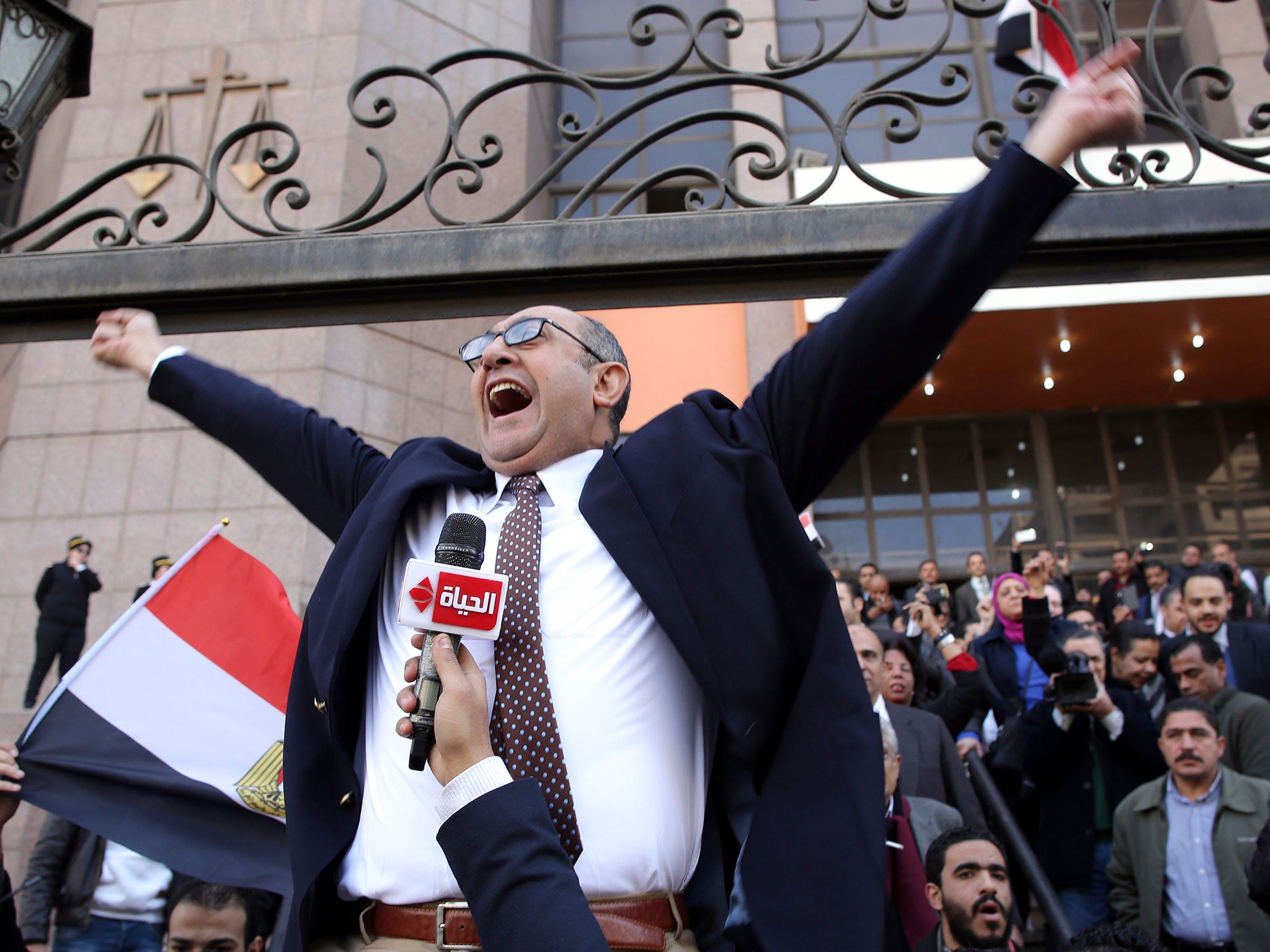 Egyptian lawyer and former presidential candidate Khaled Ali celebrates outside the State Council courthouse after the Egypt-Saudi border demarcation agreement