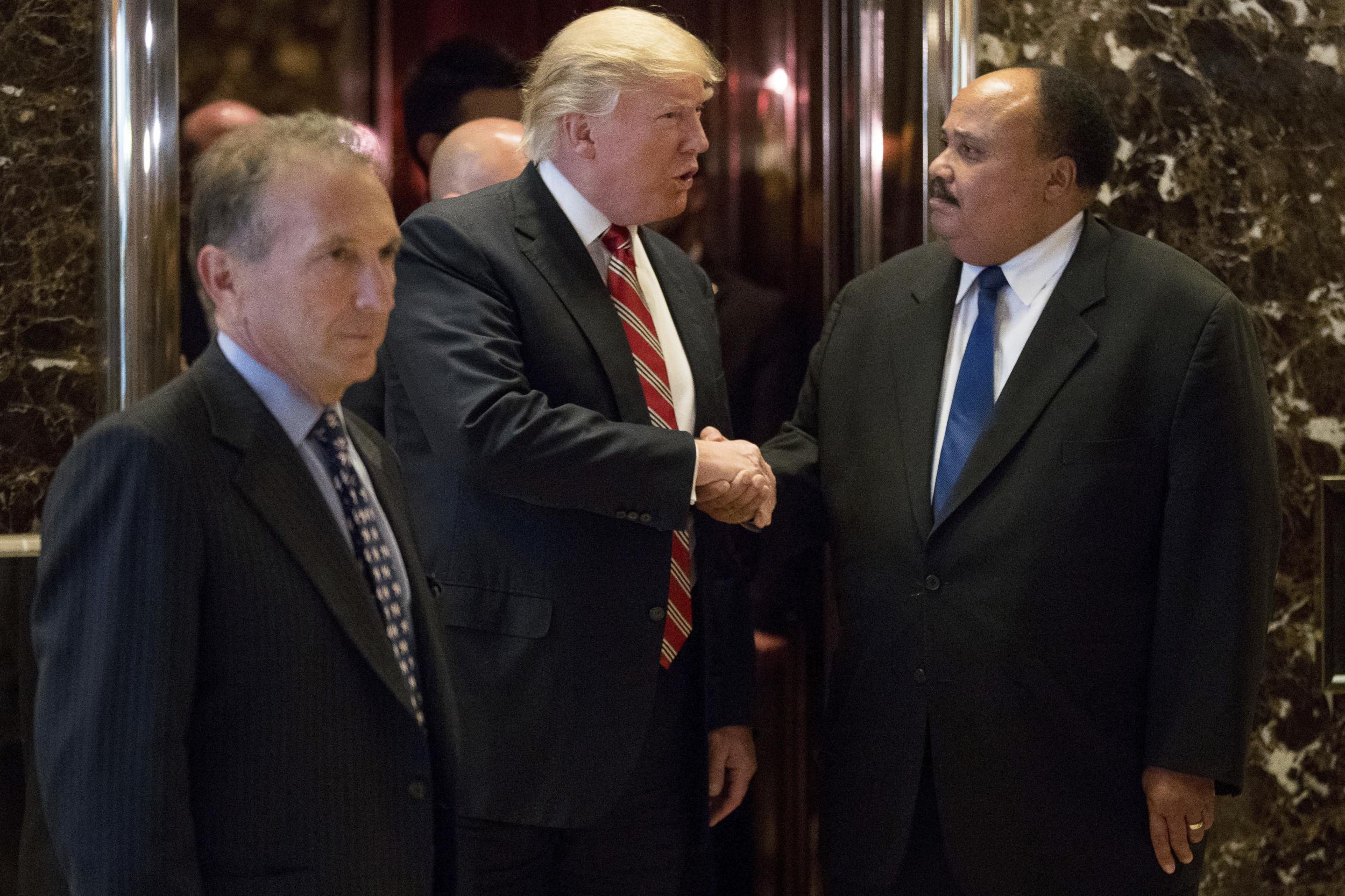 Maetin Luther King III shakes hand with the President-elect