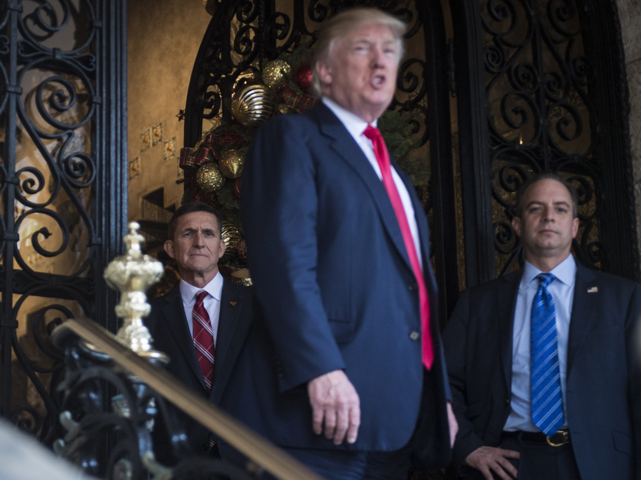 President-elect Donald Trump, retired Army Lt. Gen. Michael T. Flynn, left, and White House chief of staff-designate Reince Priebus in Palm Beach, Florida