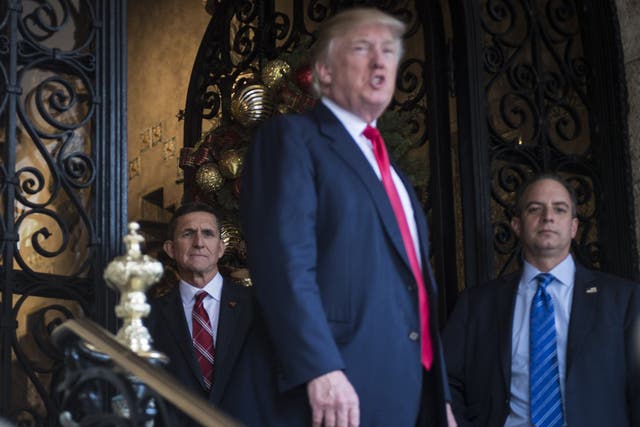President-elect Donald Trump, retired Army Lt. Gen. Michael T. Flynn, left, and White House chief of staff-designate Reince Priebus in Palm Beach, Florida