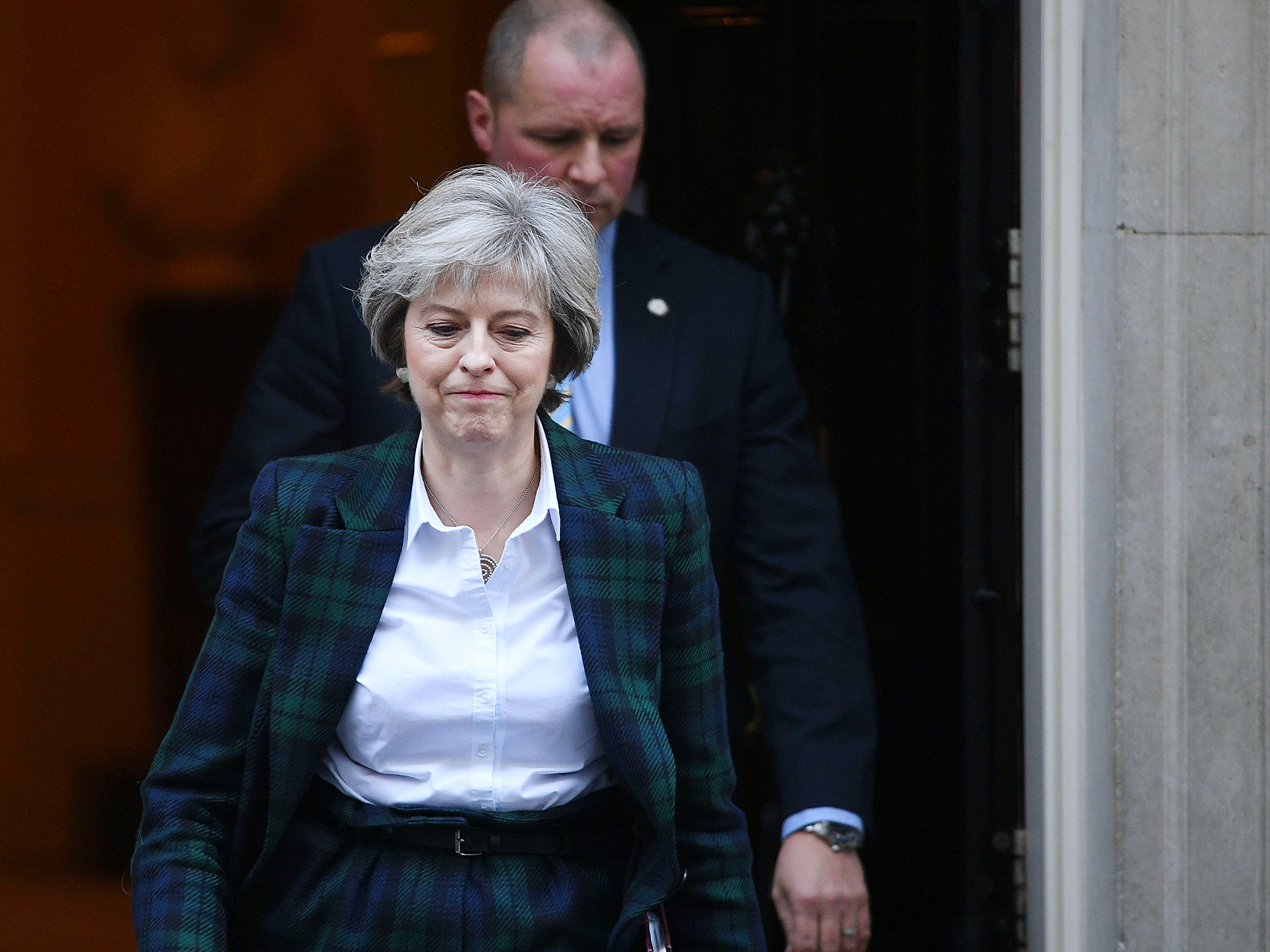 Prime Minister Theresa May leaving Downing Street in London