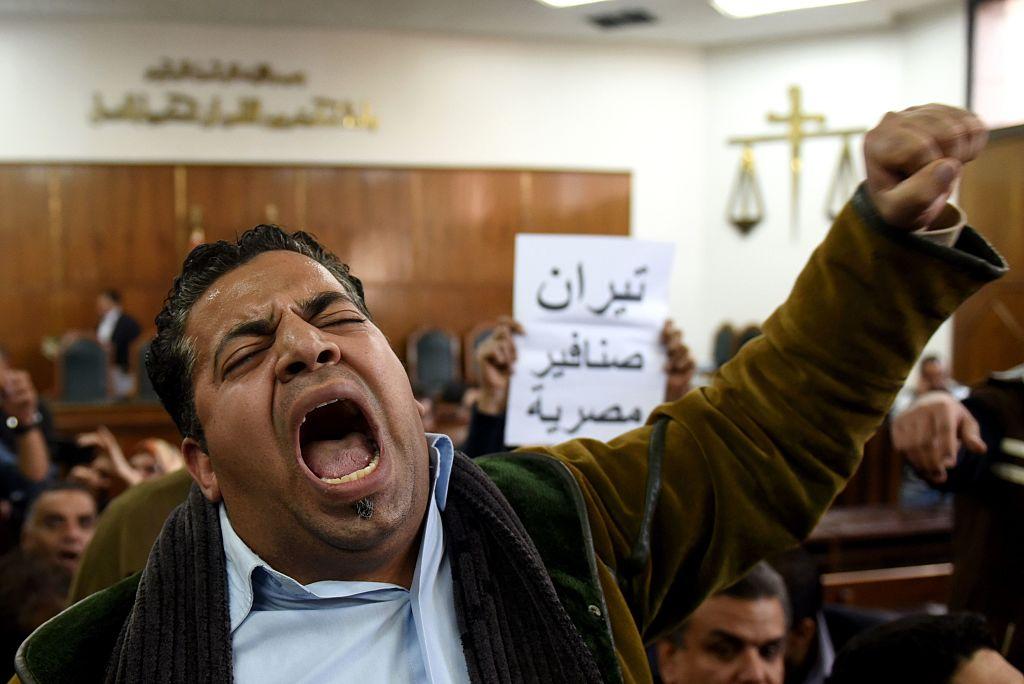 A man cheers a lower court ruling that Tiran and Sanafir belong to Egypt on December 19 2016 