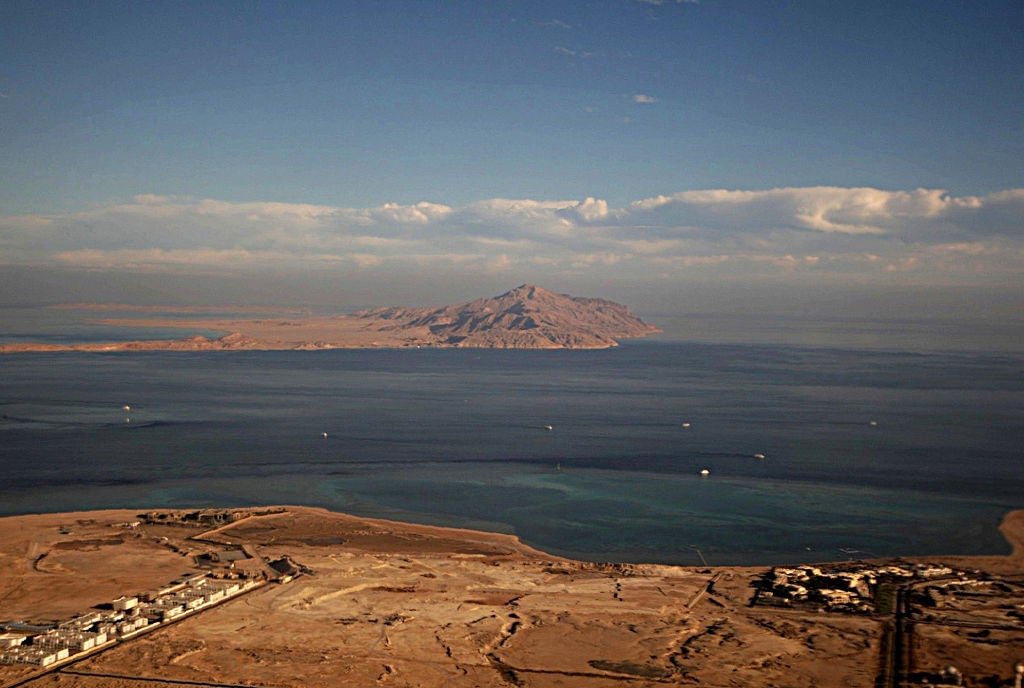 File aerial picture showing the Red Sea's Tiran (foreground) and Sanafir (background) islands in the Strait of Tiran between Egypt's Sinai Peninsula and Saudi Arabia