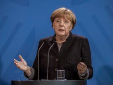 Merkel 'explains' obligations of Geneva refugee convention to Trump