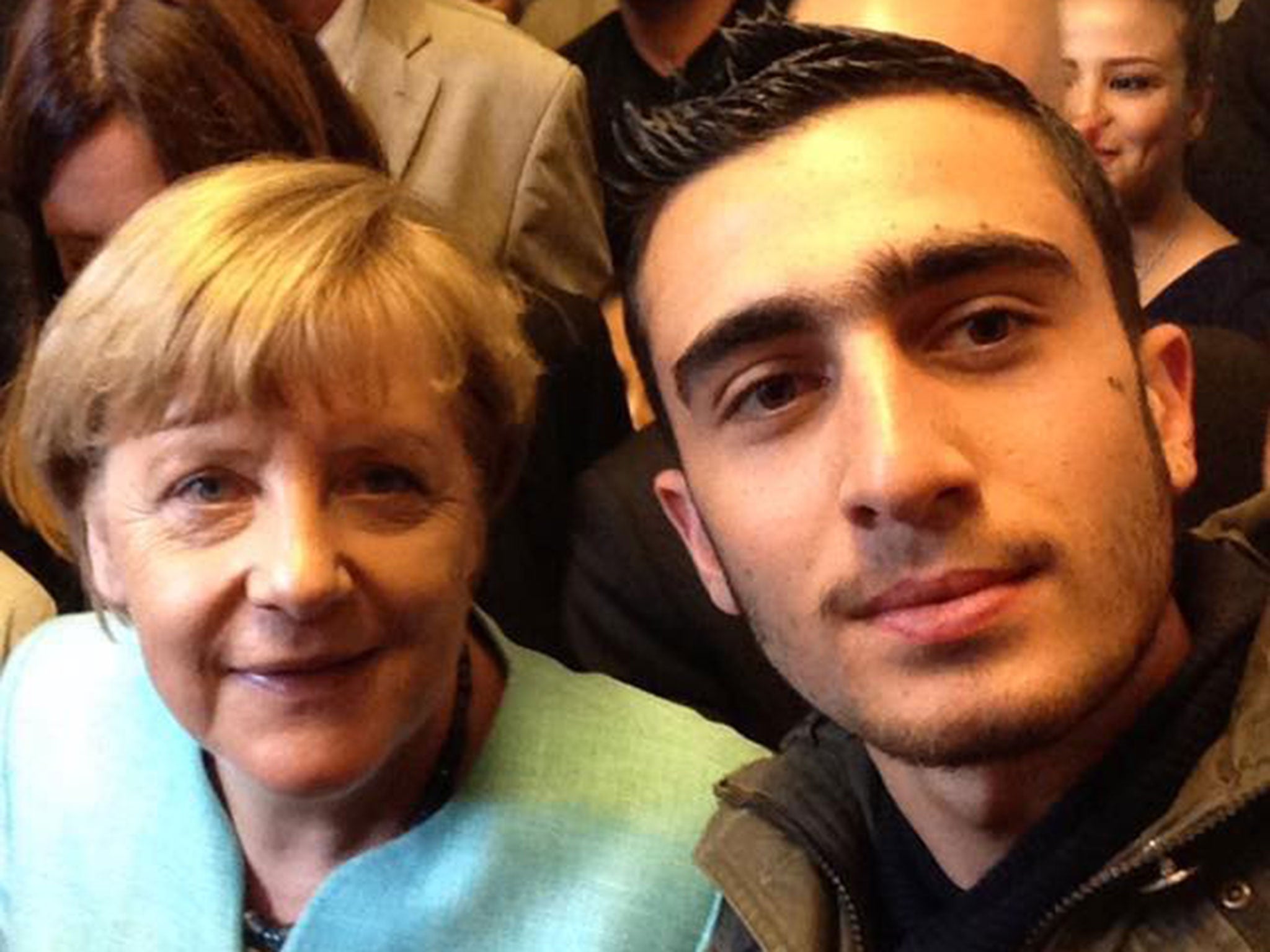 Anas Modamani, a teenage Syrian refugee, took a selfie with Angela Merkel when she visited his shelter in Berlin on 10 September 2015