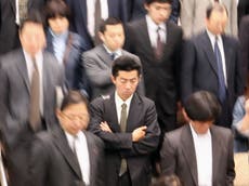 Japan encourages workers to leave work early 