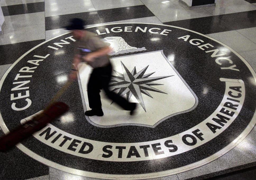 A janitor mops the floor at the headquarters of the Central Intelligence Agency