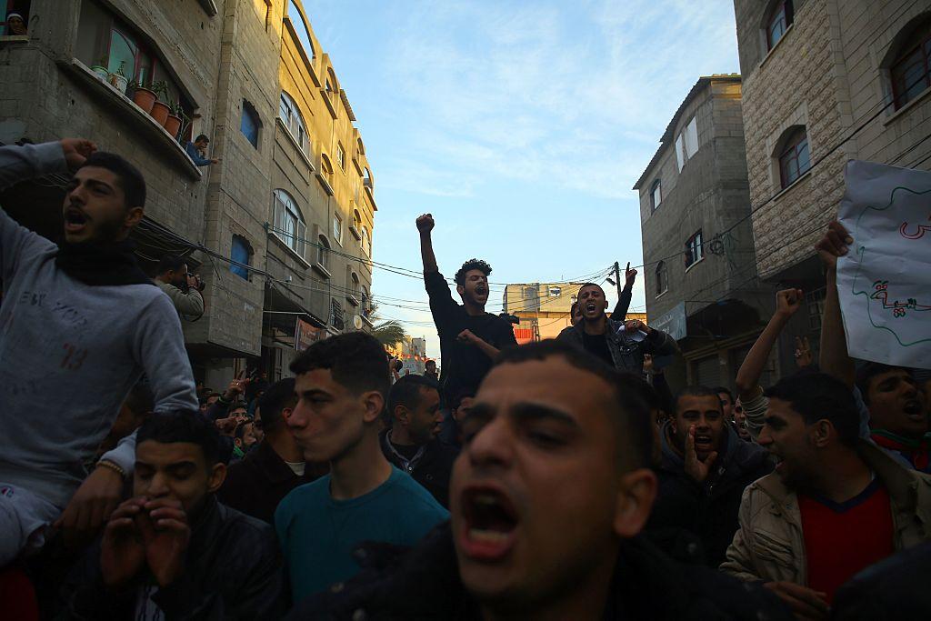 Palestinians protest against the worst power cuts in ten years in Jabalia in northern Gaza on January 12, 2017