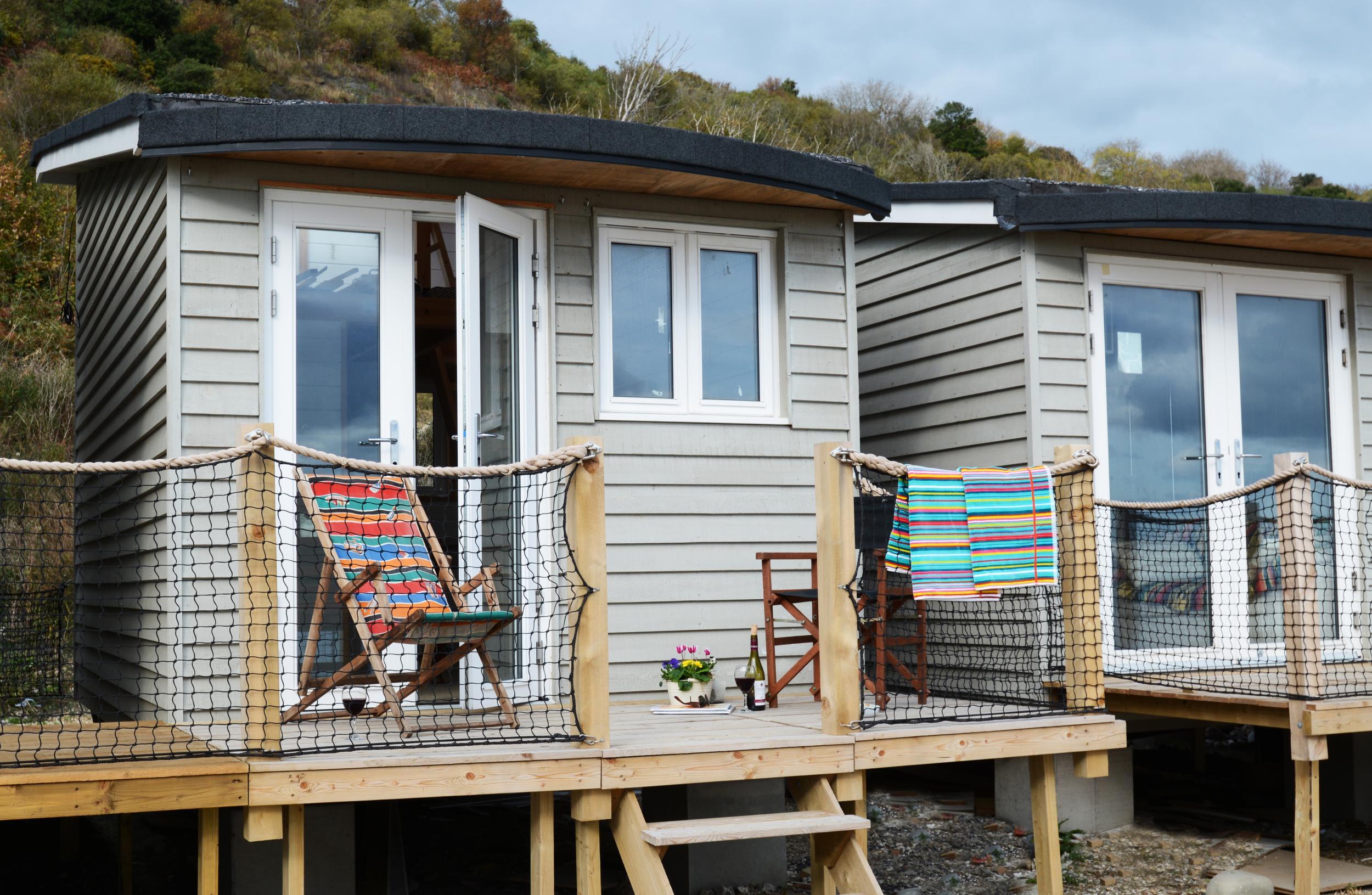 Spend the night in a beach chalet on the Jurassic coast