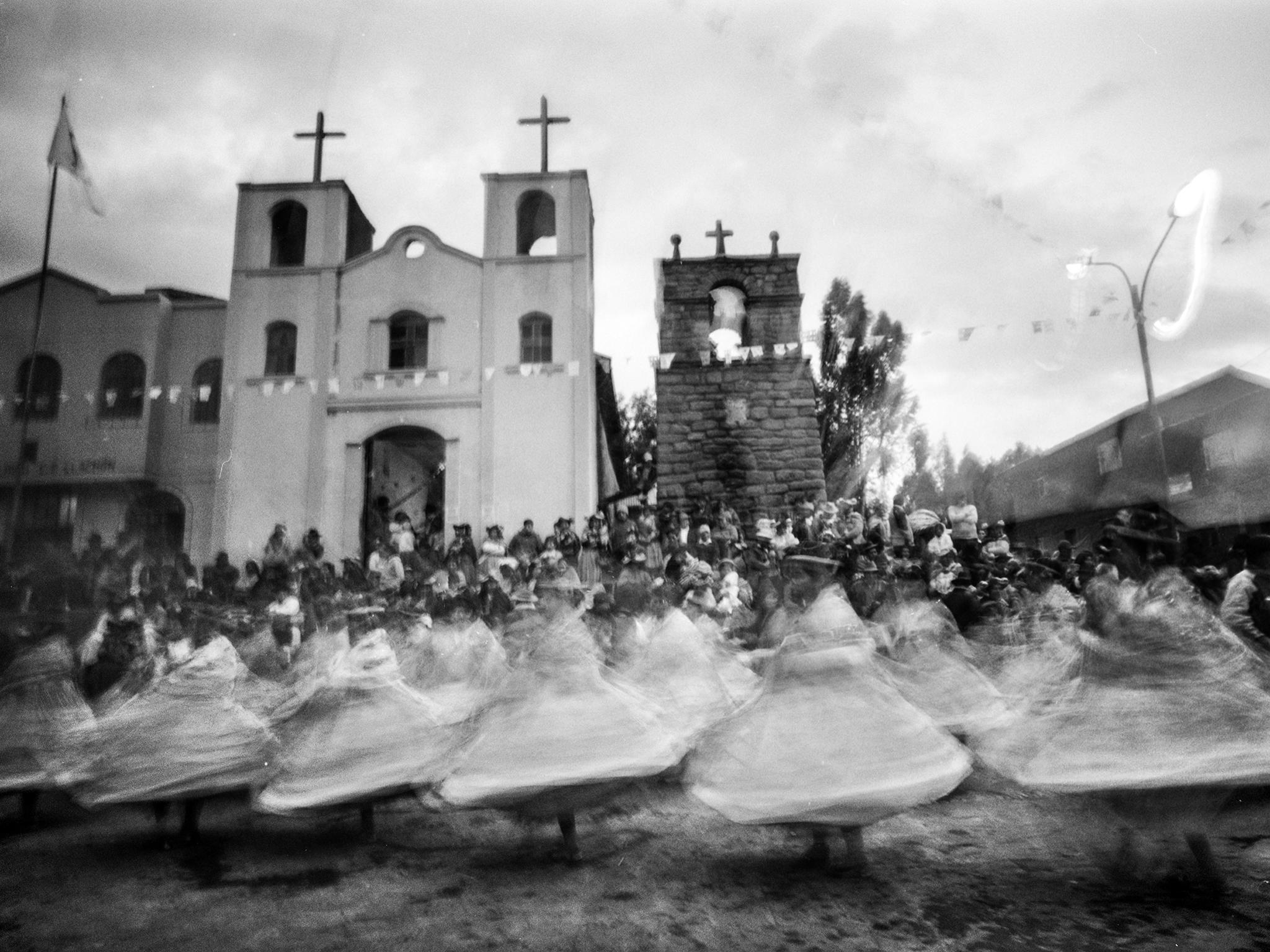 Dancers perform in Llachon during a fiesta celebrating the patron saint, Saint Anthony of Padua, and the community’s anniversary in June 2013