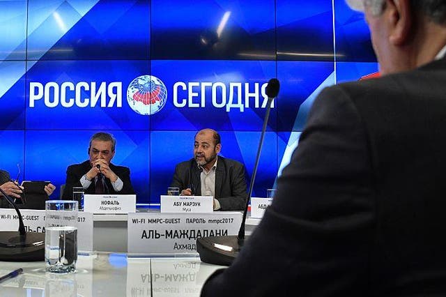 Fatah officials Azzam al-Ahmad (L), Abed al-Hafeez Nofal (C), the Palestinian ambassador to Moscow, and exiled Hamas deputy leader Mussa Abu Marzuq (R) at a press conference in Moscow on January 17, 2017