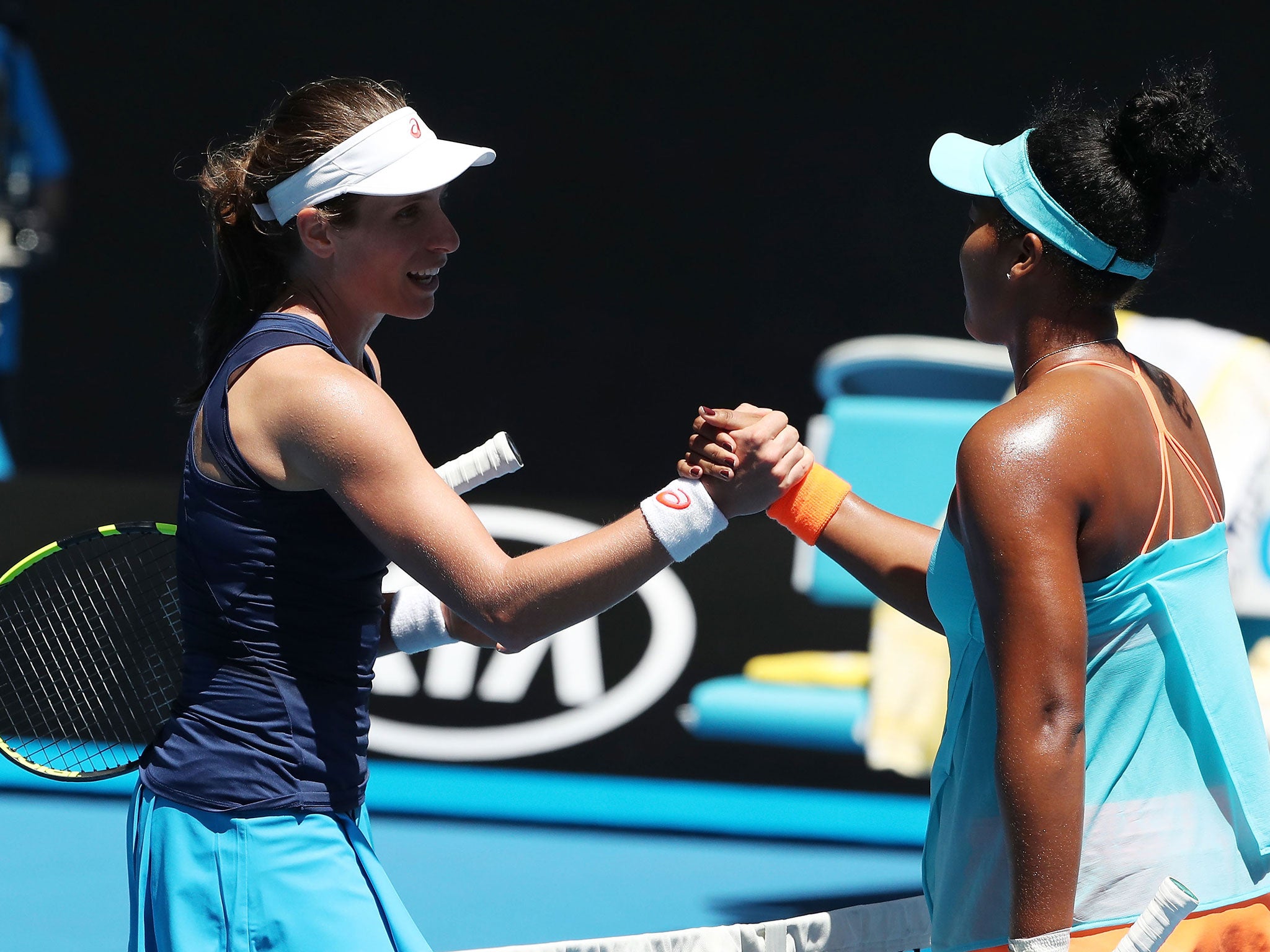 Konta shakes hands with Naomi Osaka after her second round victory