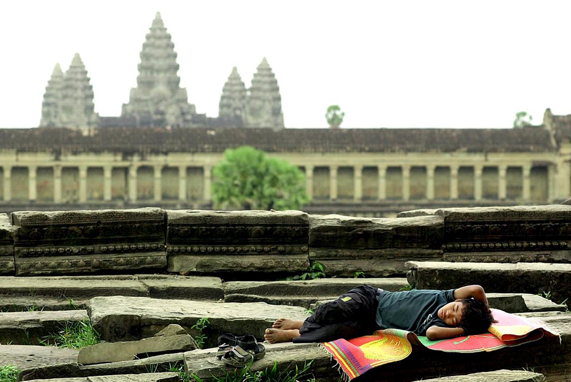 Buying souvenirs from children at Angkor Wat,?Cambodia, can cause problems in the local community