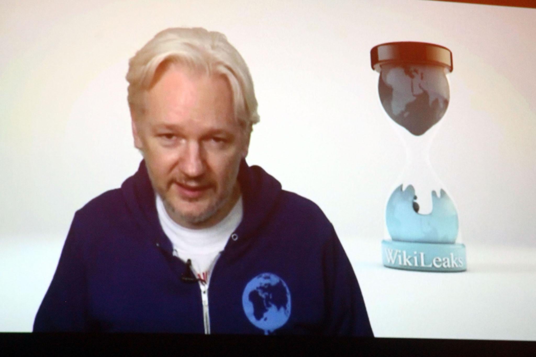 Wikileaks founder Julian Assange introduces M.I.A. via videolink from the Ecuadorian embassy in London at Terminal 5 on November 1, 2013 in New York City