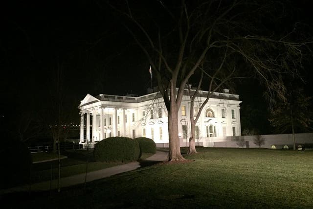 The White House, lit up on President Obama's final night.