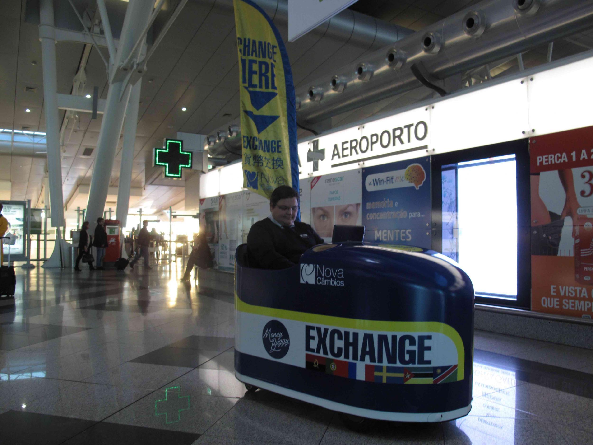 Porto airport has a bureau de change that comes to you