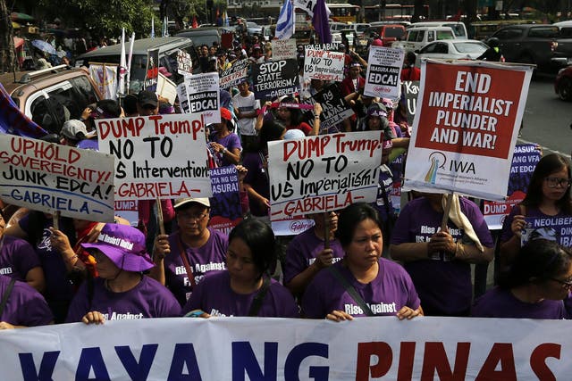 Filippino protesters outside the US embassy in Manila ahead of the Trump inauguration