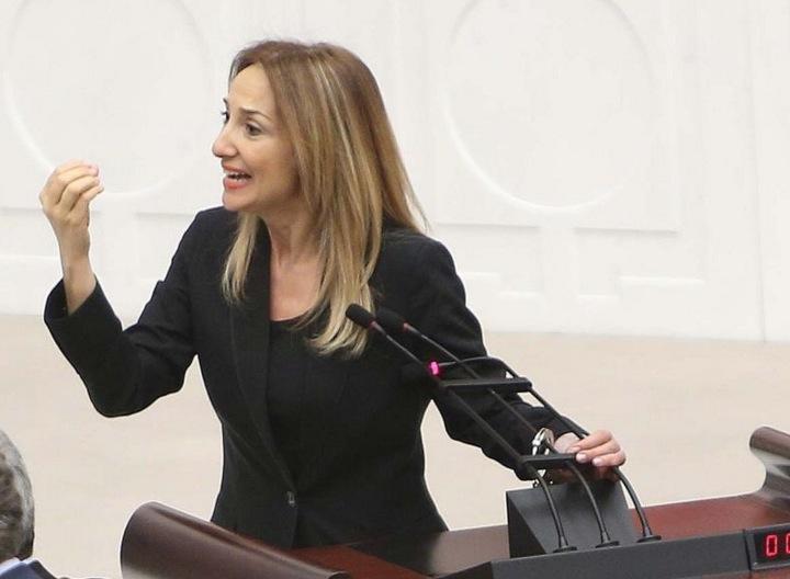 Independent MP Aylin Nazliaka chained herself to a podium inside Ankara’s parliament building, a move that led to a fistfight between female representatives