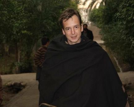 Matthew Leeming wears a Pashtun cloak in Afghanistan (Jonathan Boone)