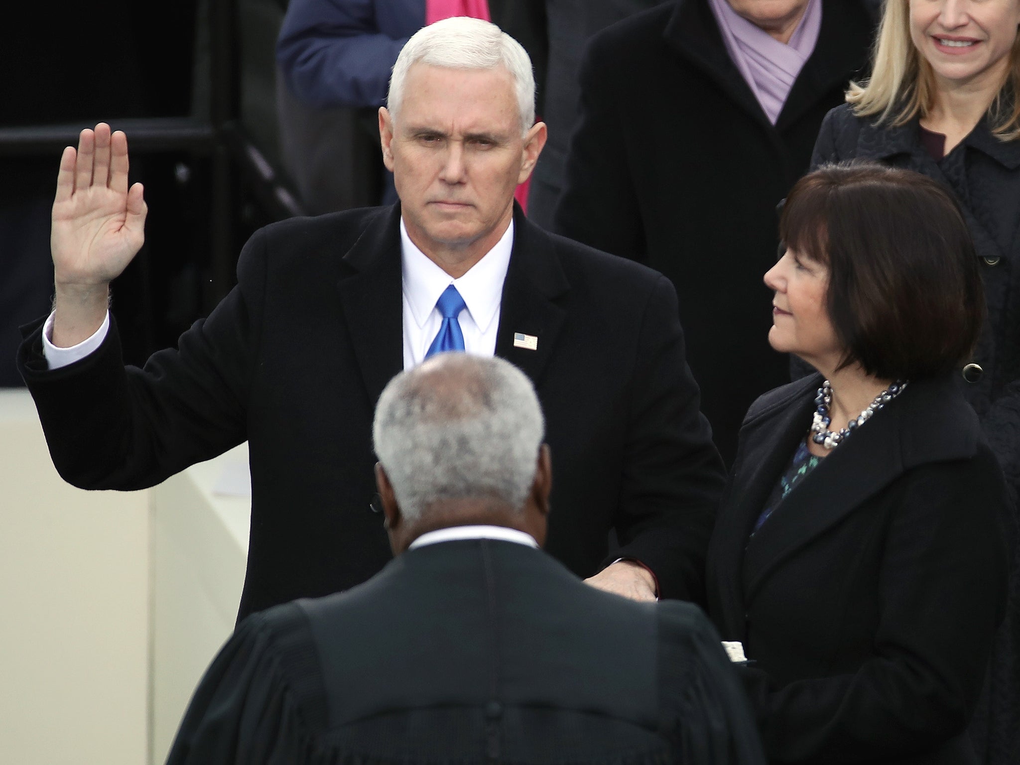 Mike Pence takes the oath of office on the West Front of the US Capitol in Washington