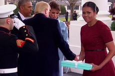 Awkward moment as Melania gives Michelle a Tiffany box 
