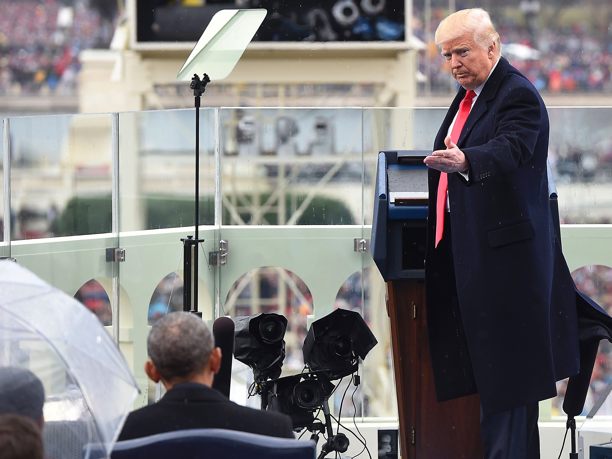 US President Donald Trump thanks former US President Barack Obama during the Presidential Inauguration at the US Capitol in Washington DC