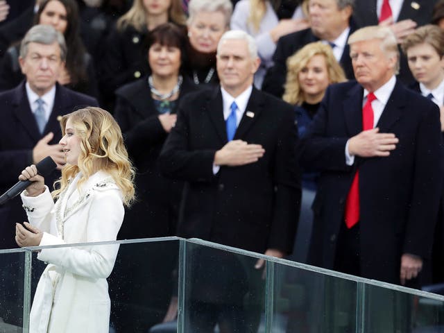 Jackie Evancho performs the National Anthem as Vice President Mike Pence and President Donald Trump watch