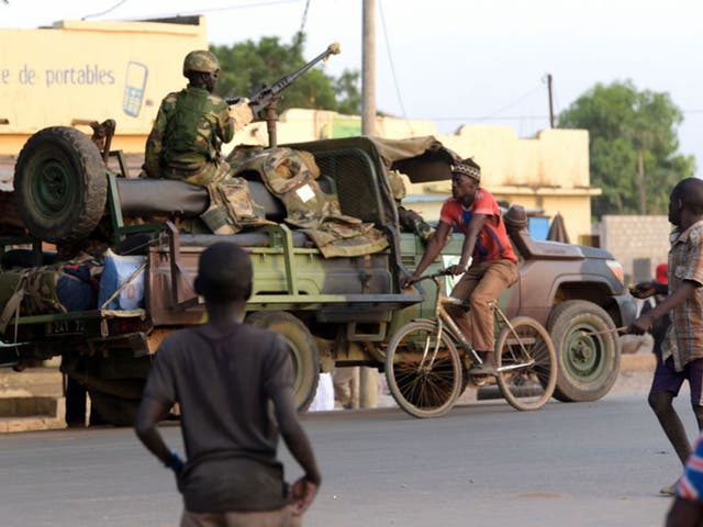 Senegalese soldiers patrol the area close to the Senegal-Gambia border near Karang on Friday