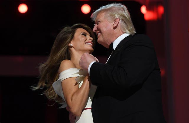 US President Donald Trump and the first lady Melania Trump dance at the Liberty Ball at the Washington DC Convention Center following Donald Trump's inauguration as the 45th President of the United States, in Washington, DC, on January 20, 2017.