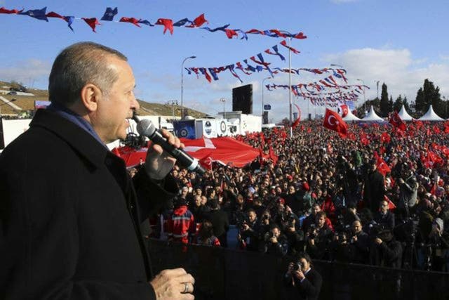 President Erdogan addresses supporters in Istanbul, hours after the parliamentary vote passed