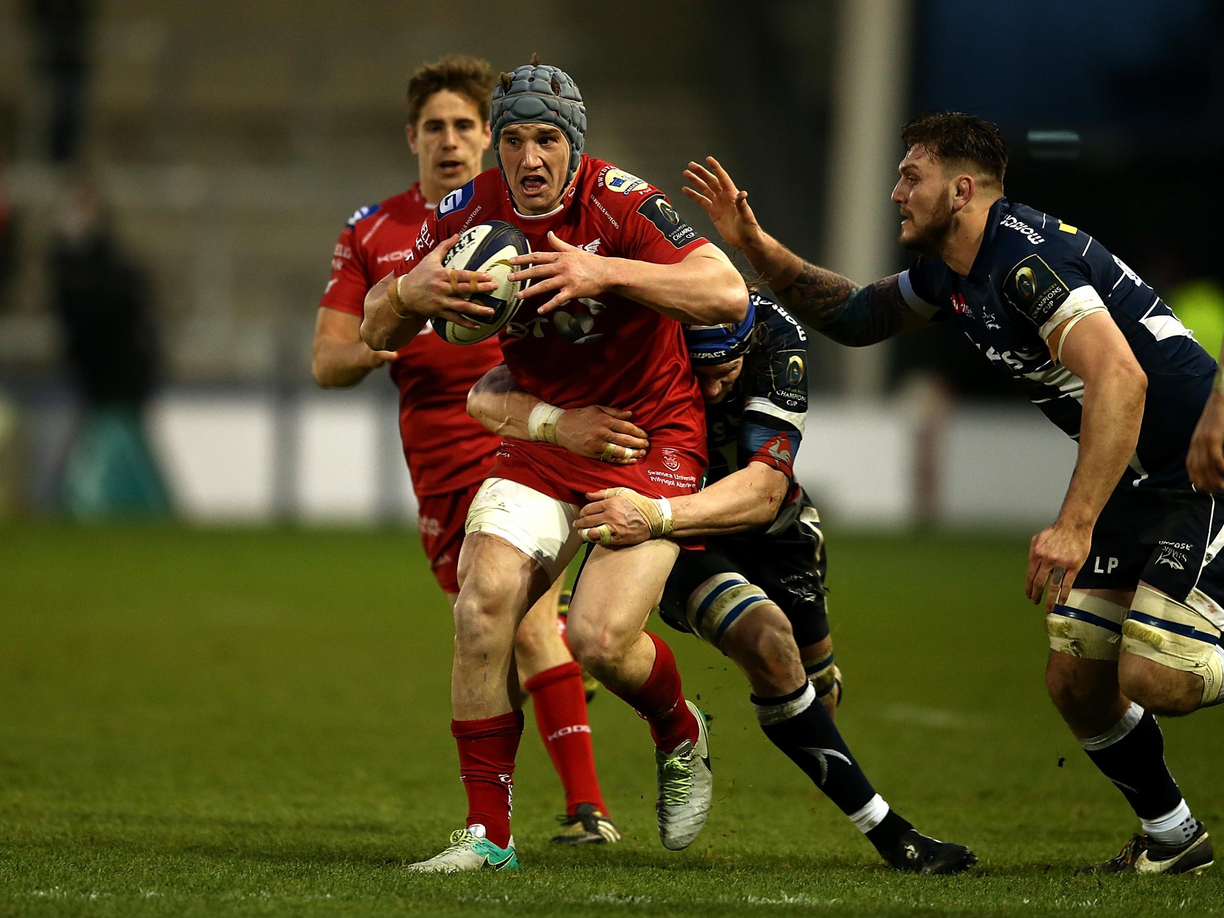 Jonathan Davies tries to break through the tackle