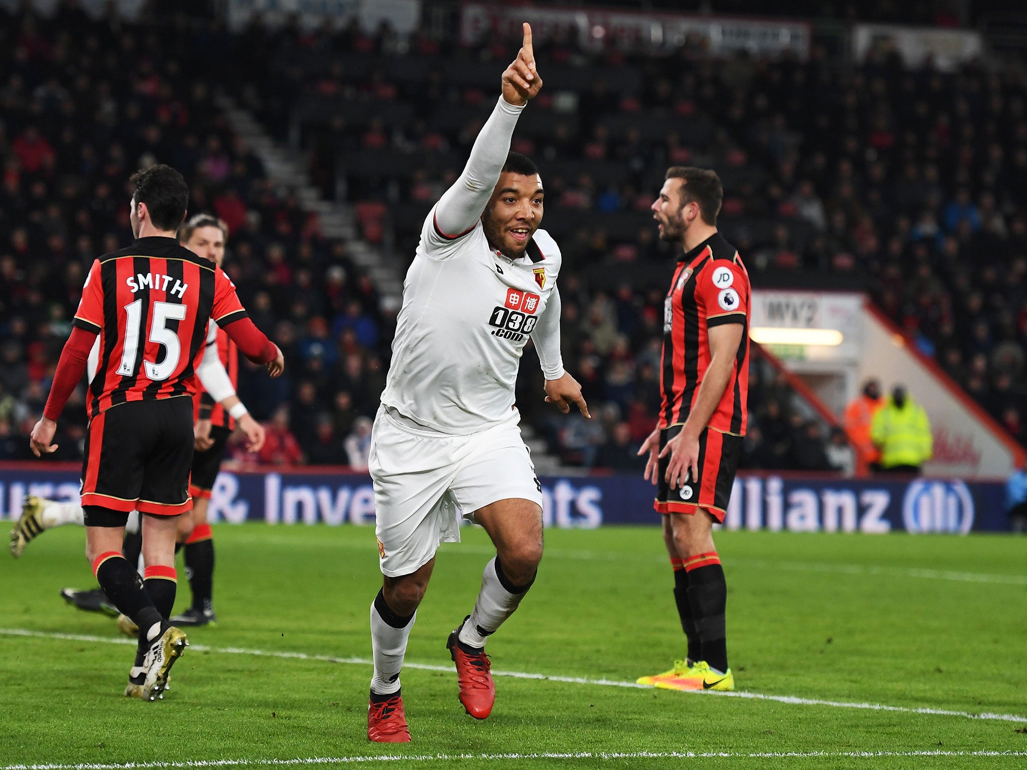 Troy Deeney celebrates after heading in Watford's second goal