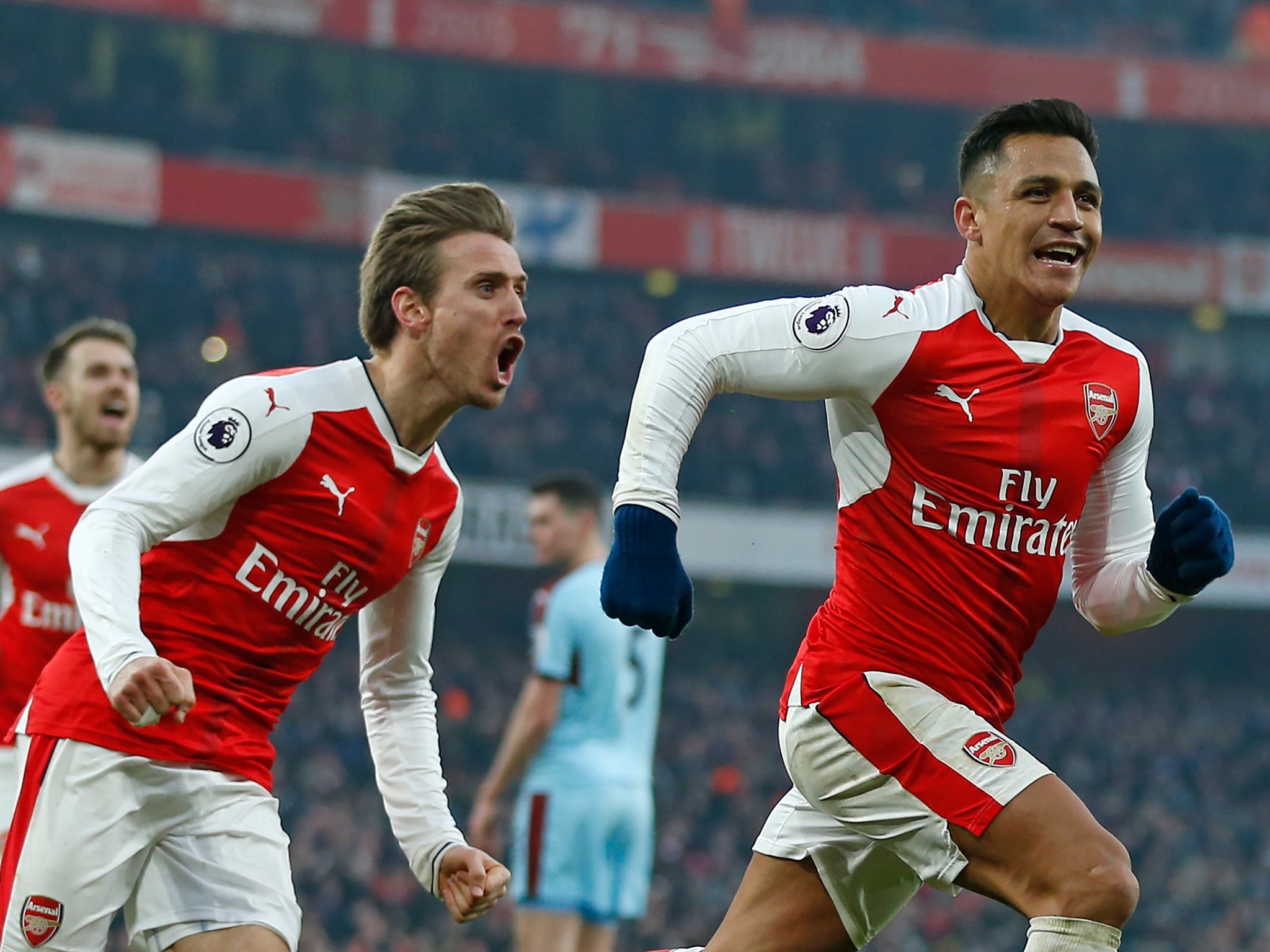 Alexis Sanchez kept his nerve to cheekily lob the ball past Tom Heaton in stoppage time