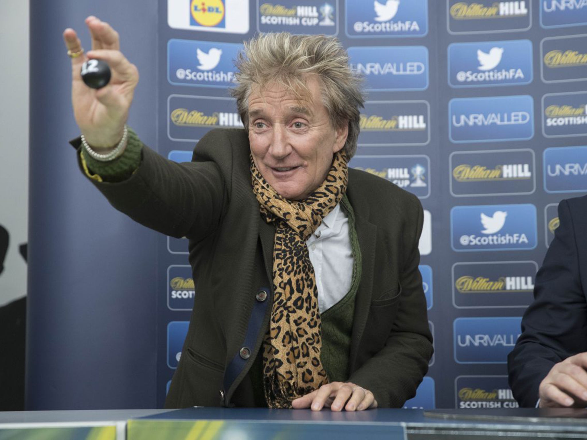 Sir Rod Stewart pulls out Rangers Ball during the William Hill Scottish Cup Fifth Round Cup Draw