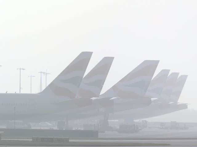 Planes in the fog at Heathrow Airport