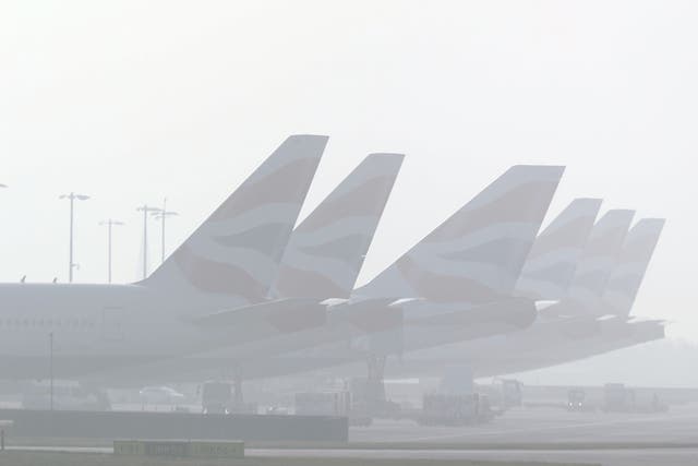 Planes in the fog at Heathrow Airport