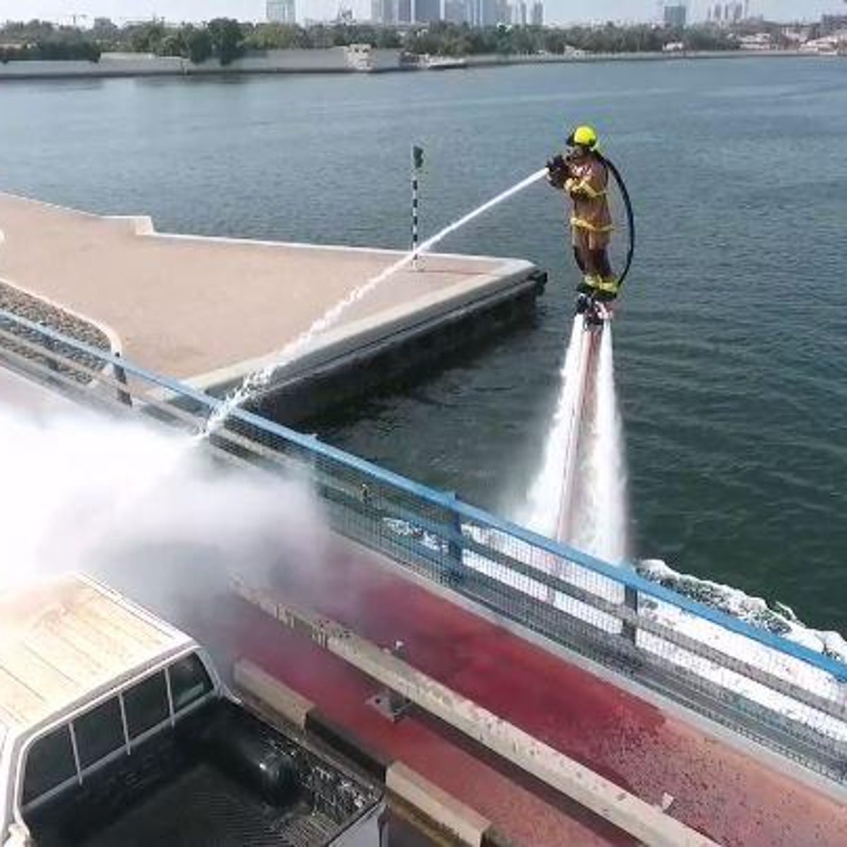 Dubai firefighters use water jetpacks to avoid city's heavy traffic, The  Independent