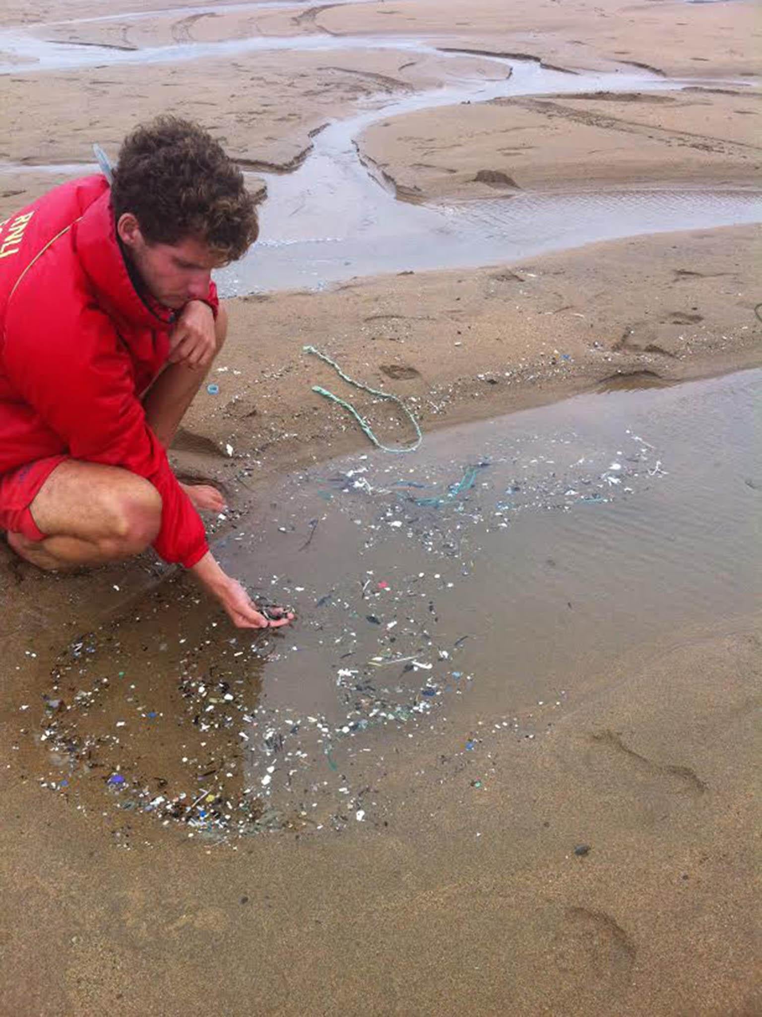 Jim Scown finds microplastics, which collect in pools once the tide has gone out