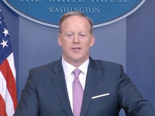 Mr Spicer had a lower podium on Monday to improve the perception of his accessibility to the press