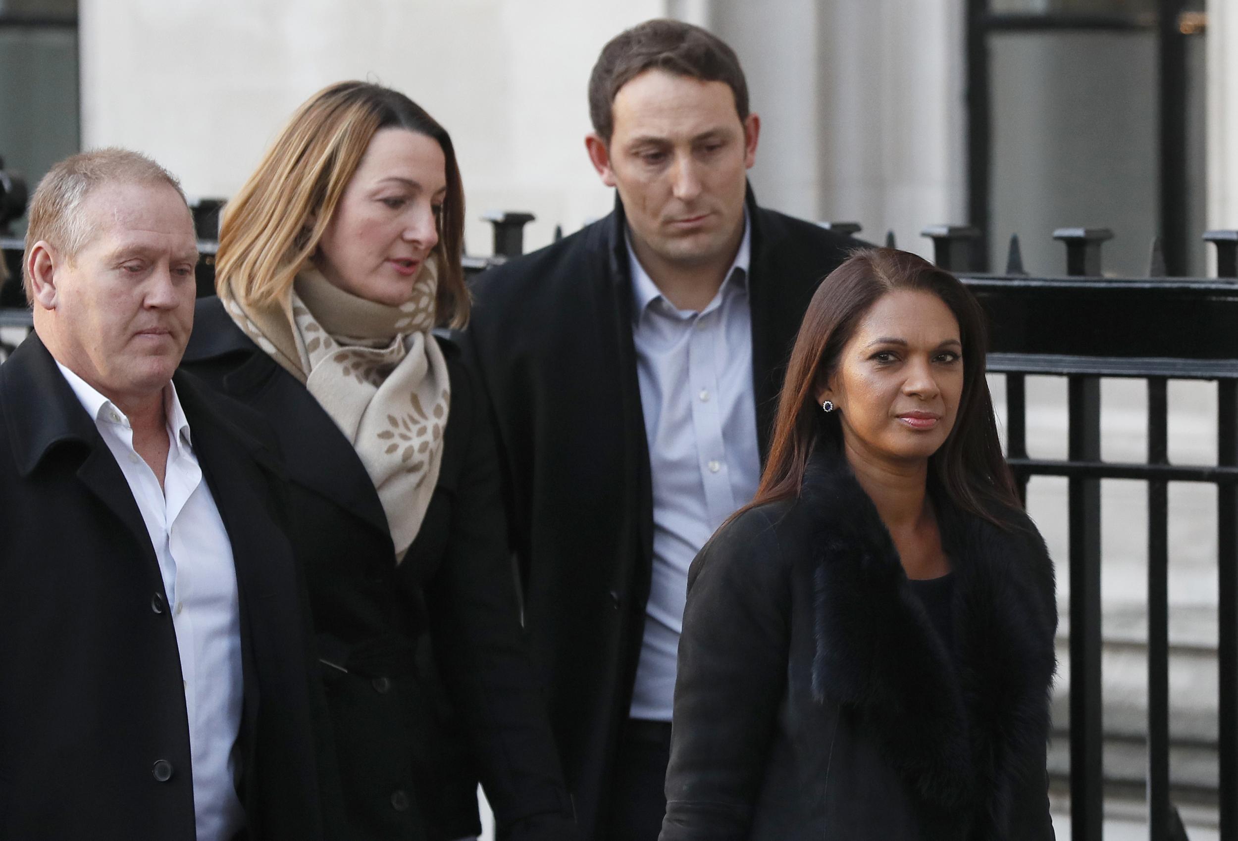 Gina Miller, right, the lead claimant in the legal fight to get Parliament to vote on whether Britain can start the process of leaving the European Union, arrives at the Supreme Court in London, Tuesday, Jan. 24, 2017. Britain's Supreme Court will rule Tuesday on whether the prime minister or Parliament has the right to trigger the process of taking Britain out of the EU.