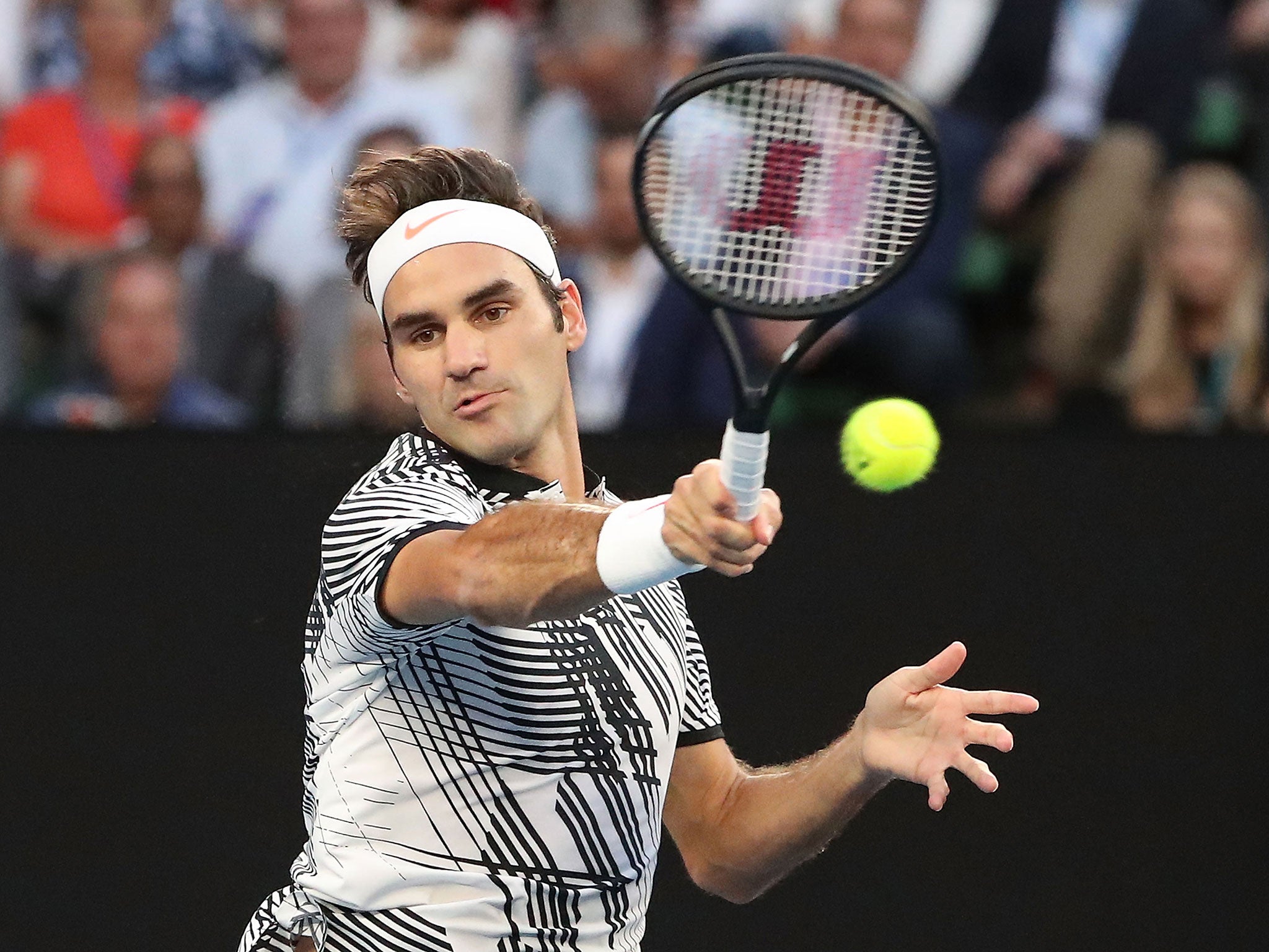 Federer in action against Zverev