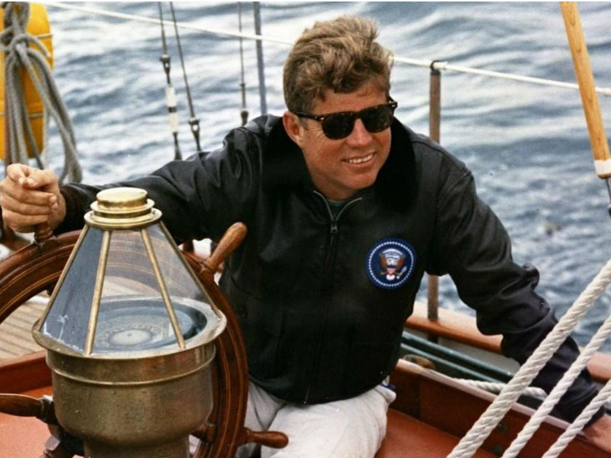 John F Kennedy sailing off the coast of Maine in 1962. The President sought to project a rugged image, without signs of weakness and emotion