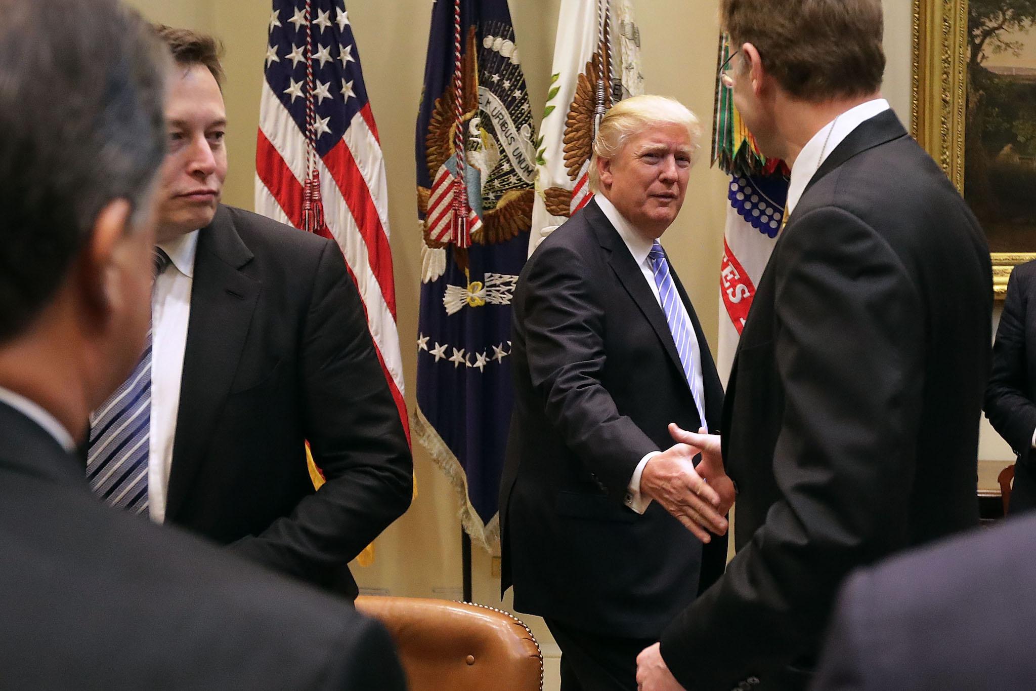 Donald Trump meets Elon Musk and other other business leaders as he arrives for a meeting in the Roosevelt Room at the White House