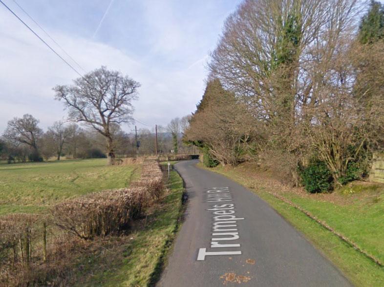 The trio were found dead in what is believed to be a farm cottage along Trumpets Hill Road between Reigate and the village of Betchworth