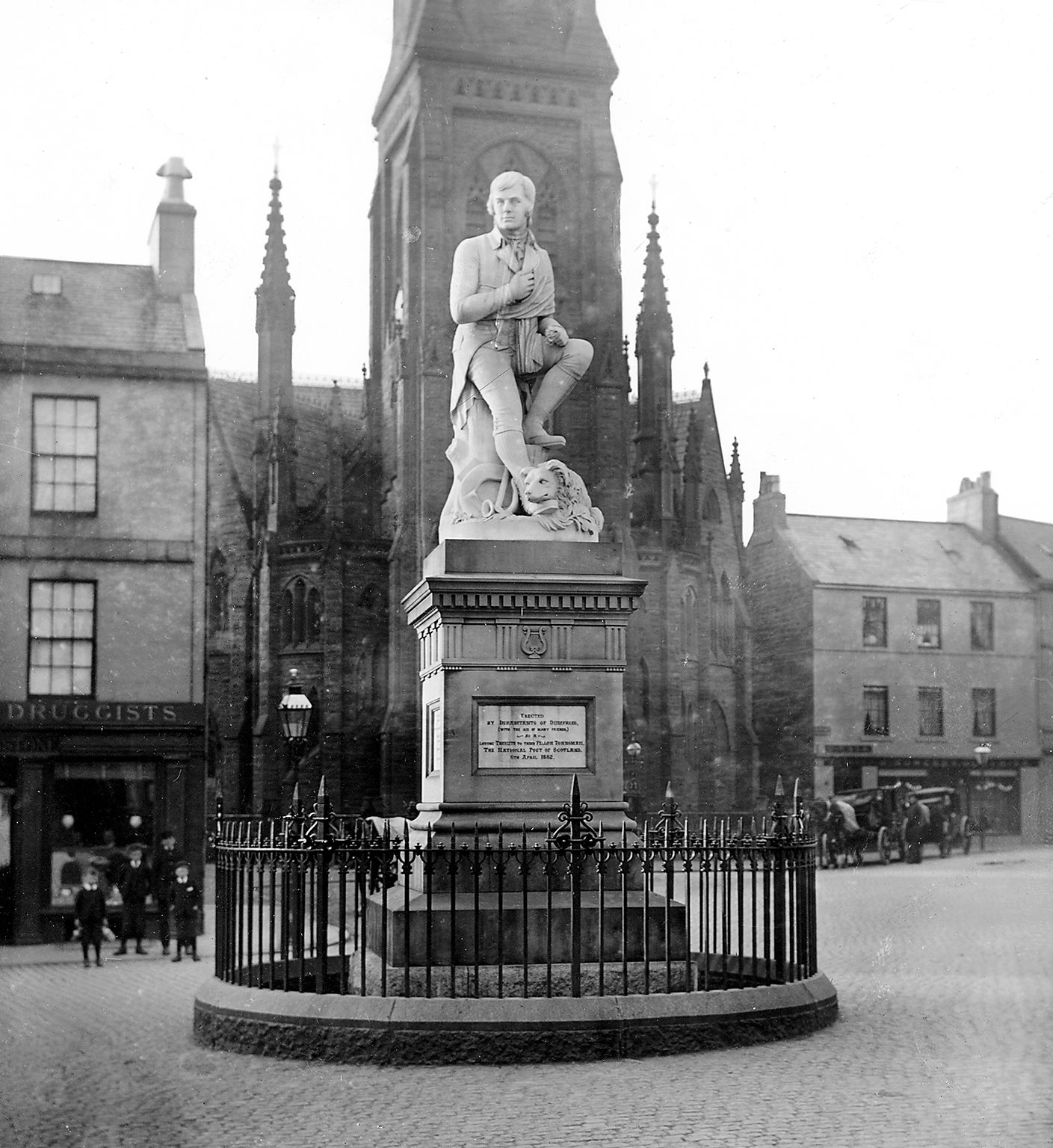 The Robert Burns monument stands as a memorial in Dumfries, Scotland, circa 1910