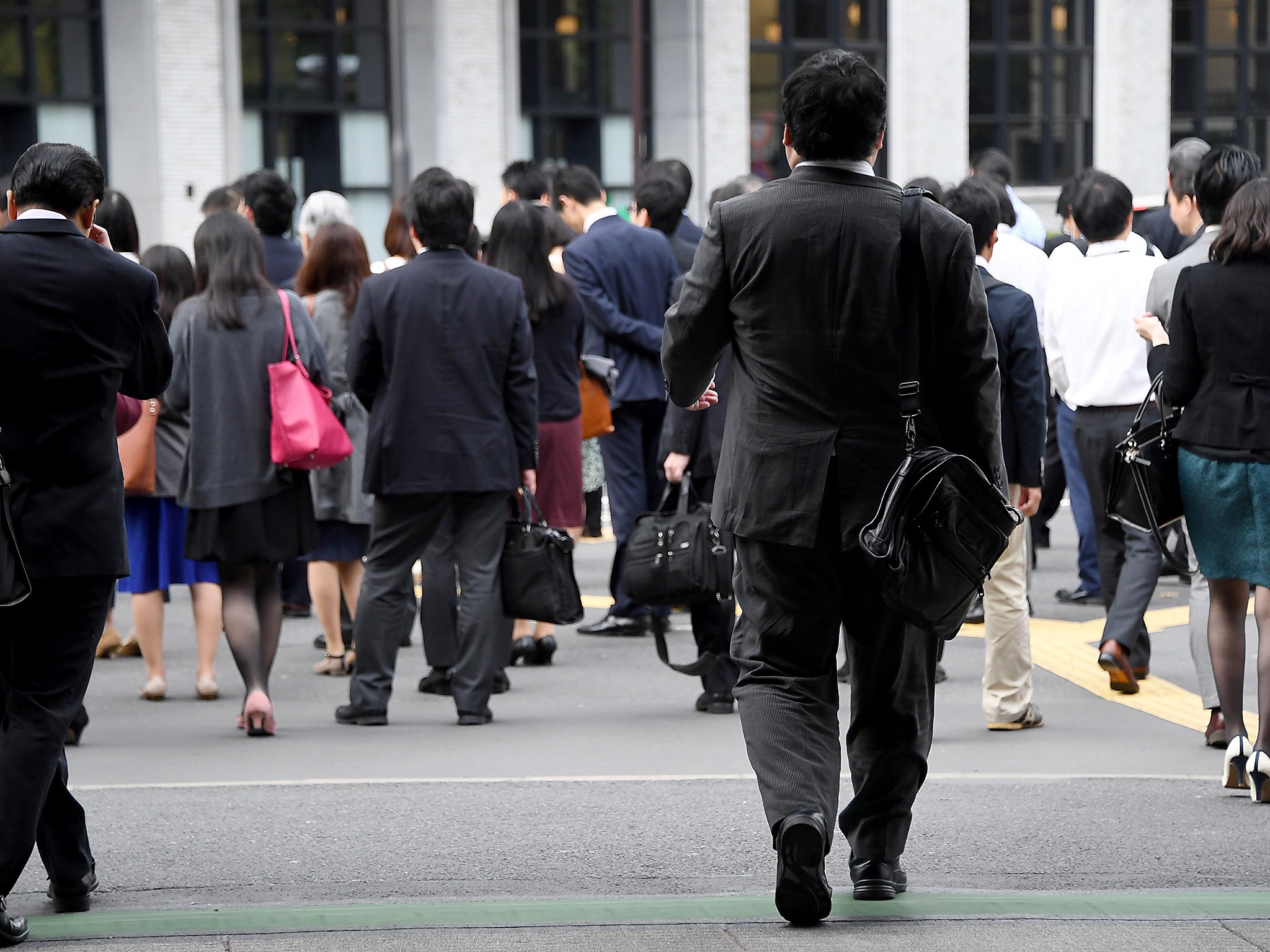 Remote working in Tokyo's public spaces is posed as a solution to reducing congestion on the roads during the 2020 Olympic Games