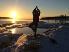 Trying out ice yoga in Swedish Lapland