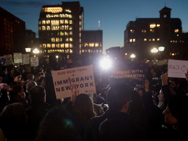 Hundreds of concerned New Yorkers protested the Muslim ban