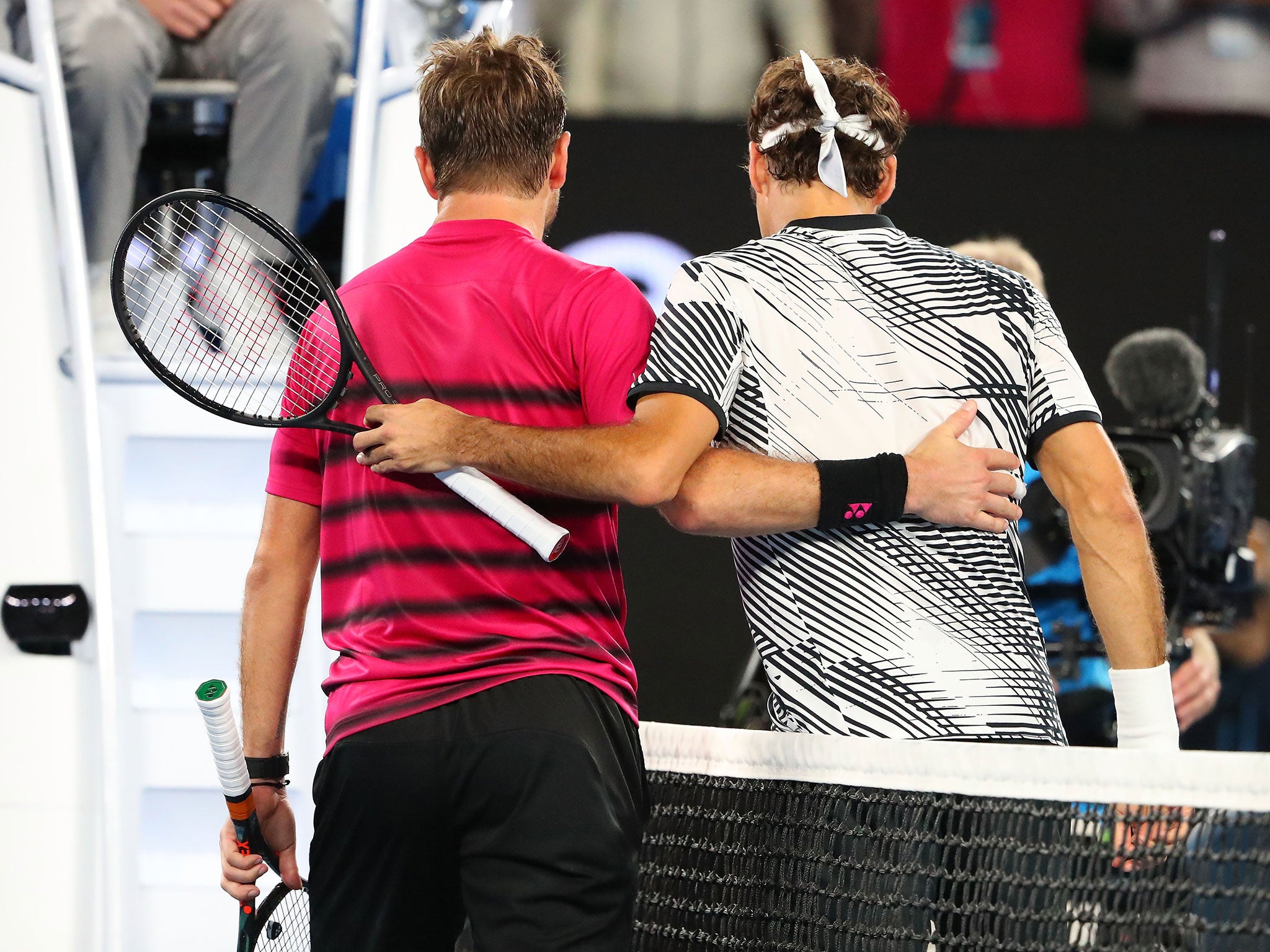 The two players embrace after their semi-final bout